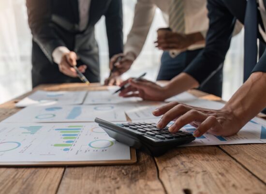 Business Consulting meeting working and brainstorming analyzing new business project finance investment concept.